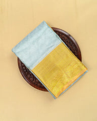 SC4799 - TISSUE SAREE WITH EMBOSE FLOWER DESIGN AND GOLD BORDER
