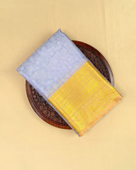 SC4799 - TISSUE SAREE WITH EMBOSE FLOWER DESIGN AND GOLD BORDER