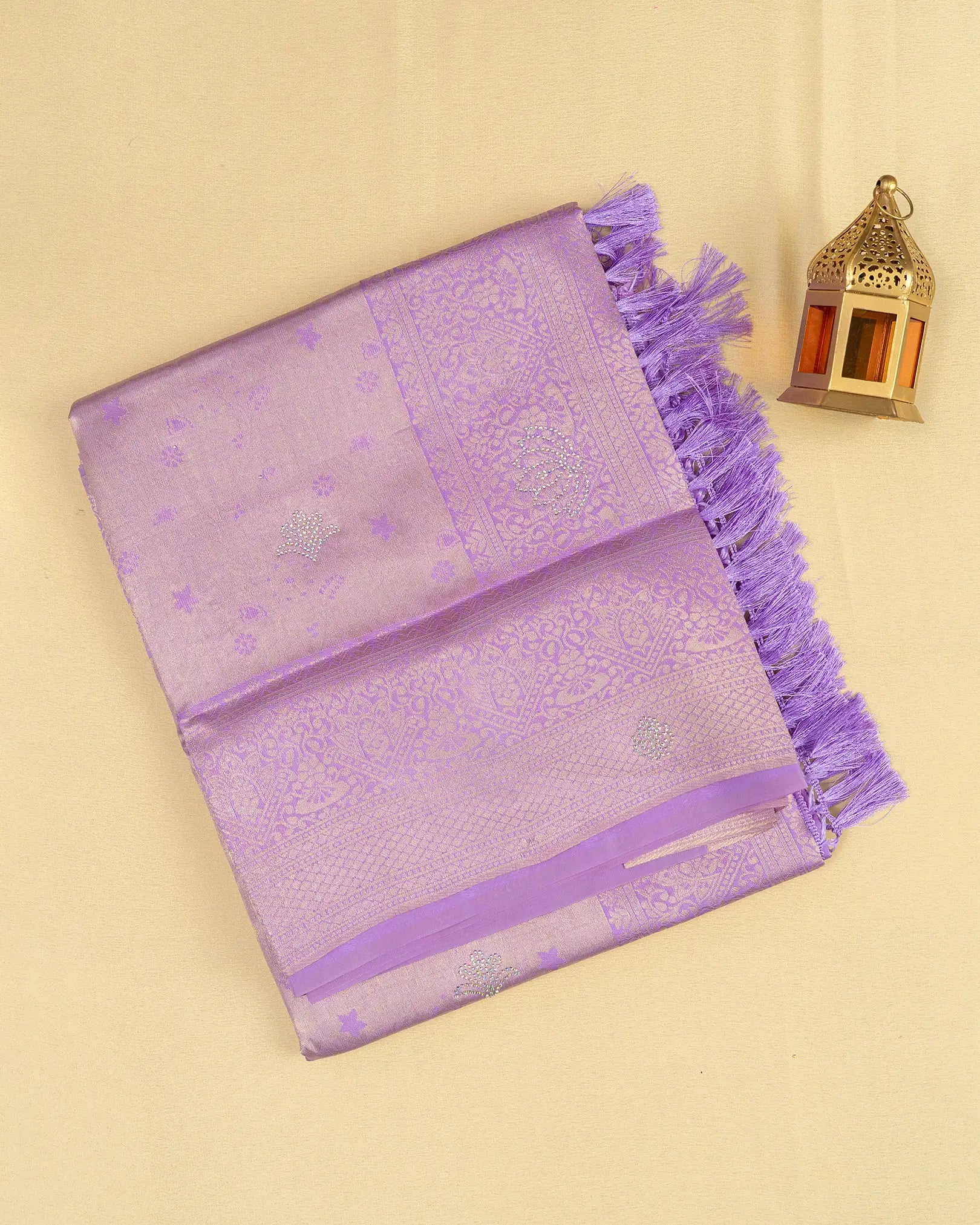 SC3604 - Tissue saree with multistone and embose body design
