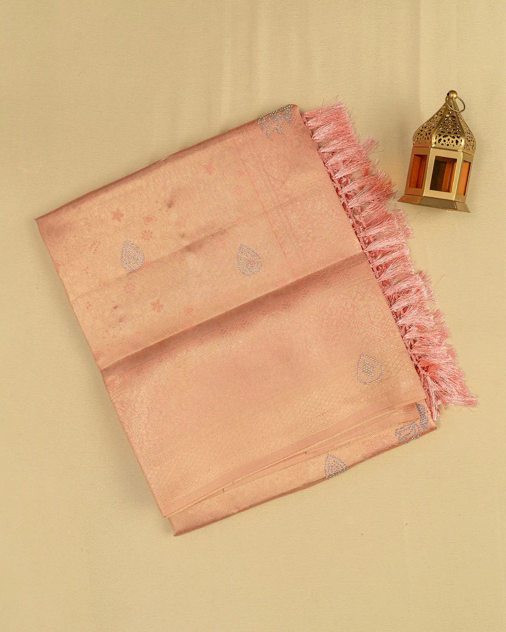 SC3604 - Tissue saree with multistone and embose body design