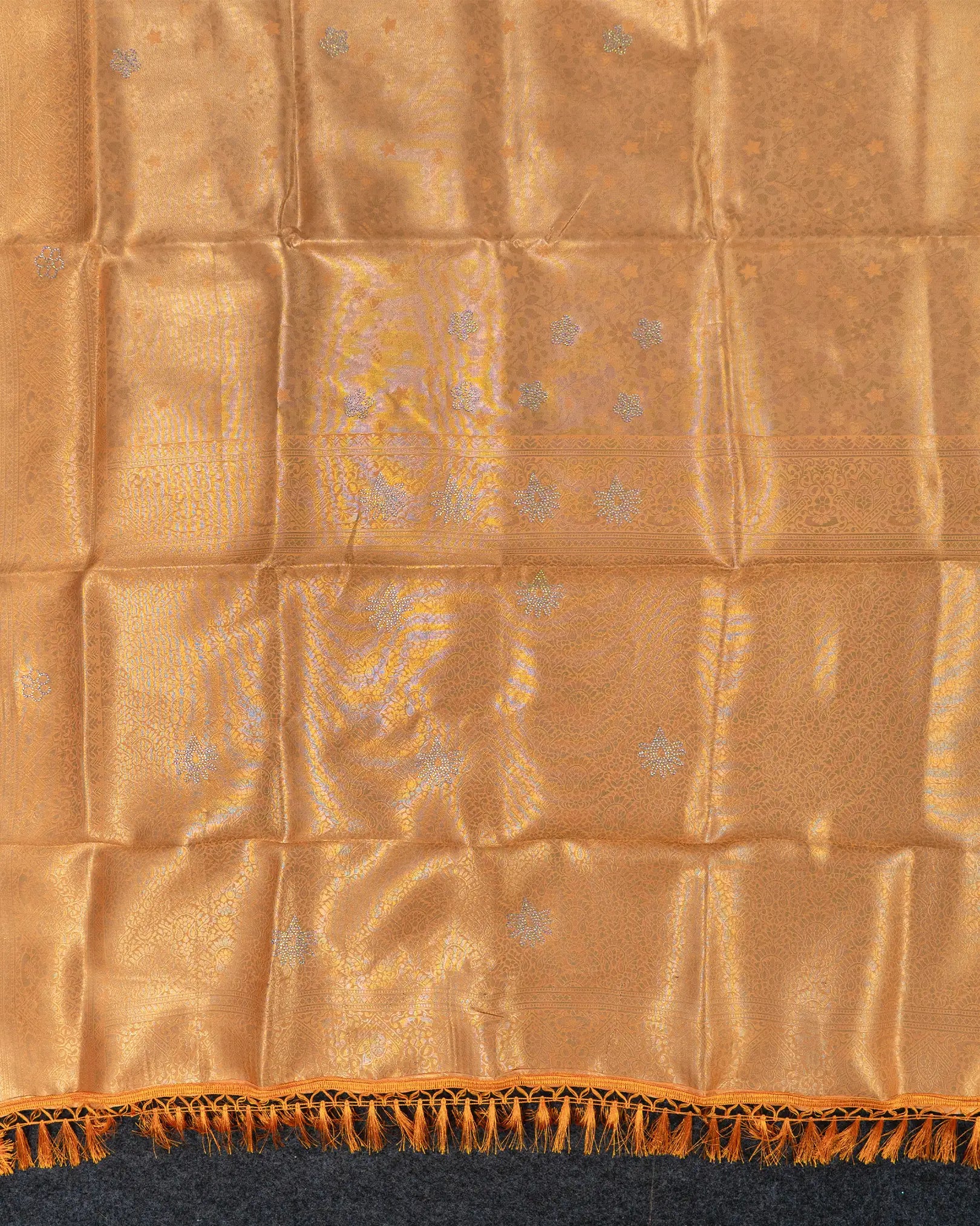 SC3604 - Tissue saree with multistone and embose body design