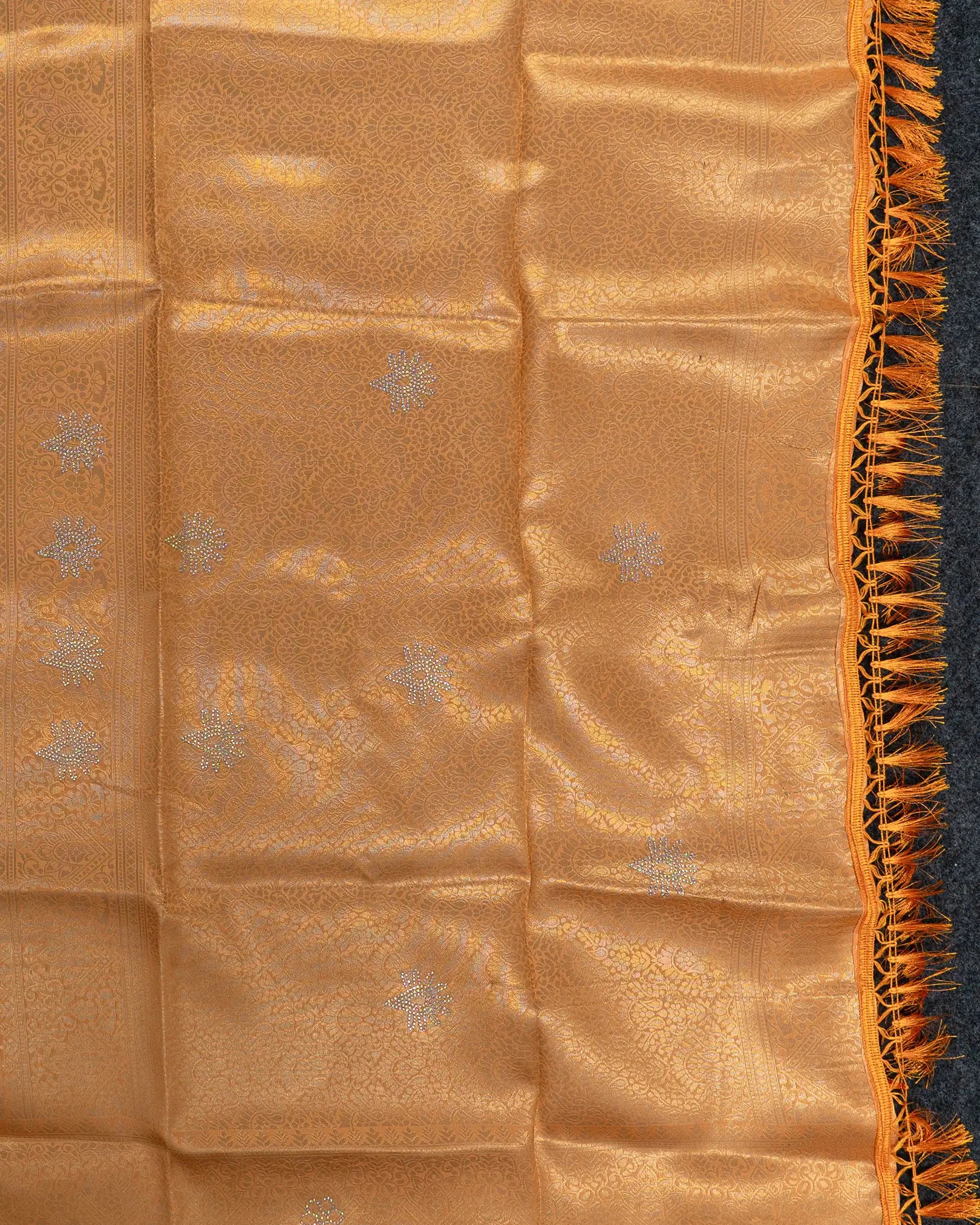 SC3604 - Tissue saree with multistone and embose body design