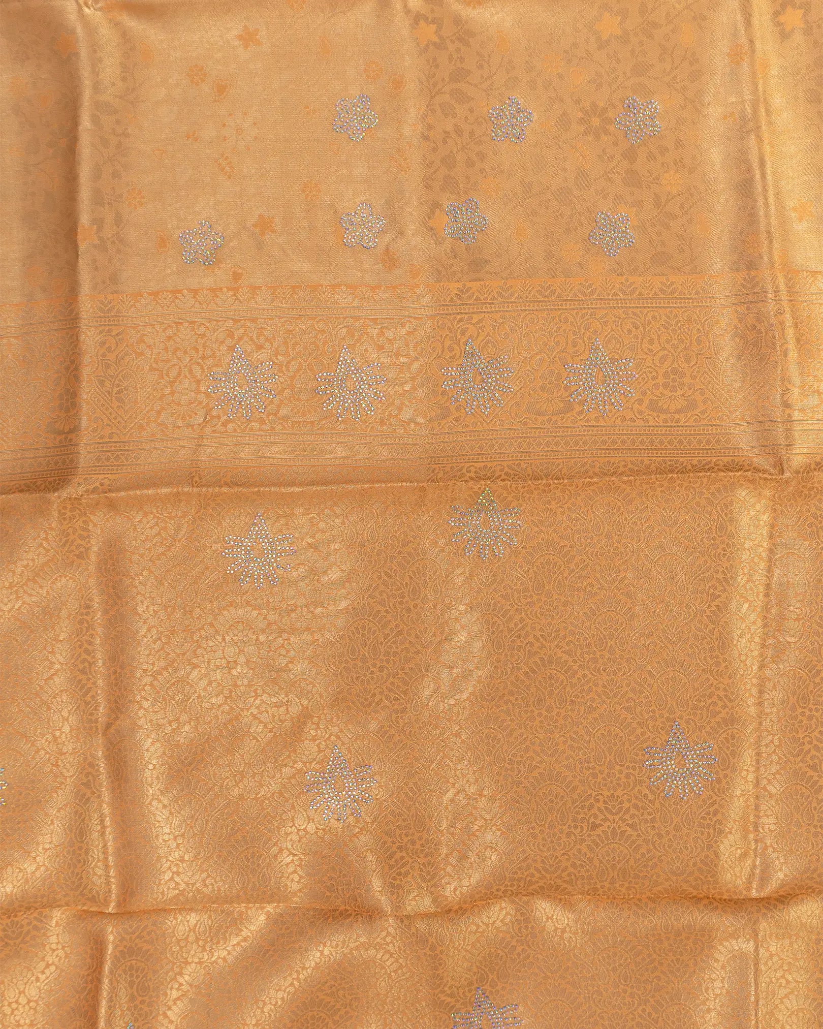 SC3604 - Tissue saree with multistone and embose body design