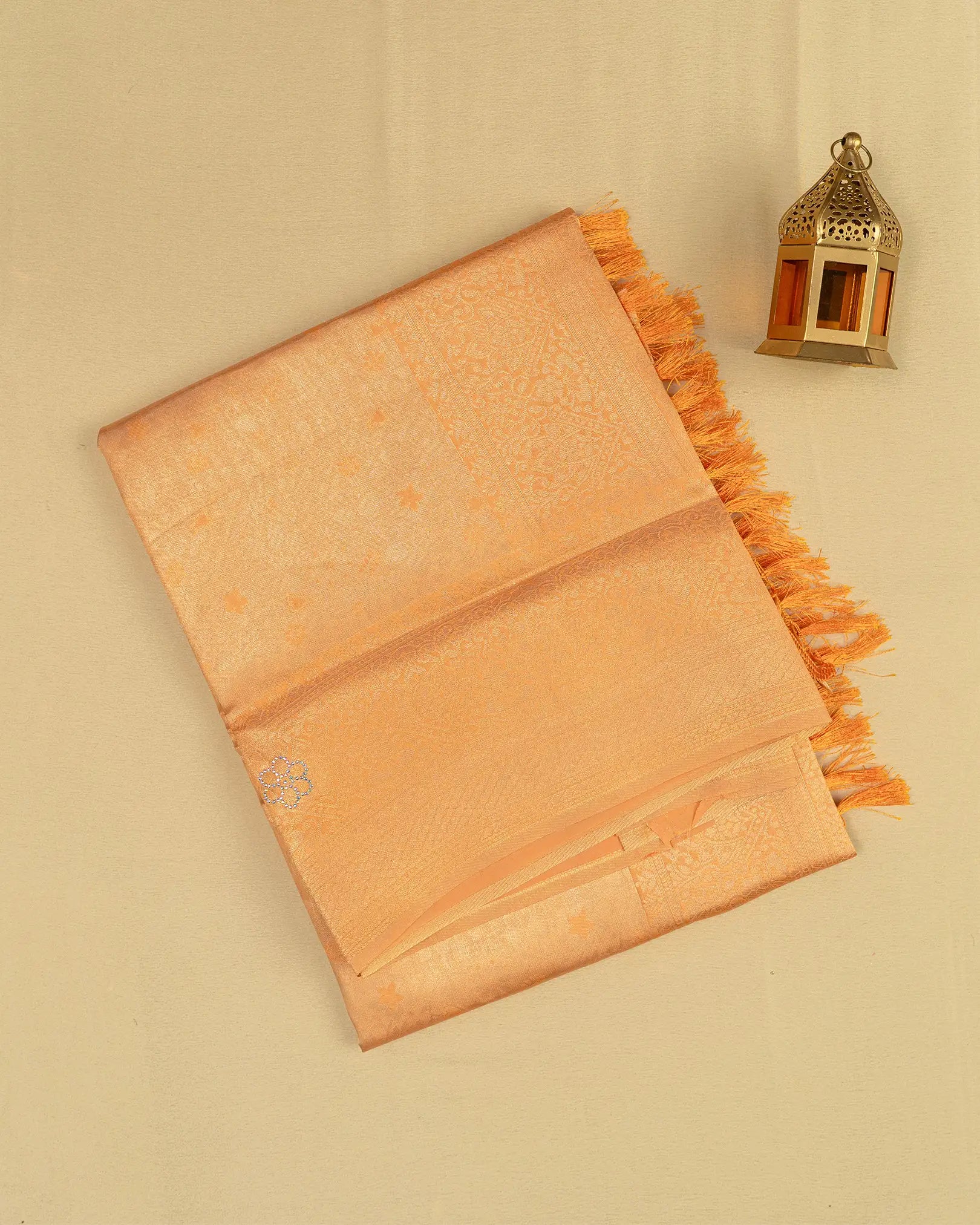SC3604 - Tissue saree with multistone and embose body design