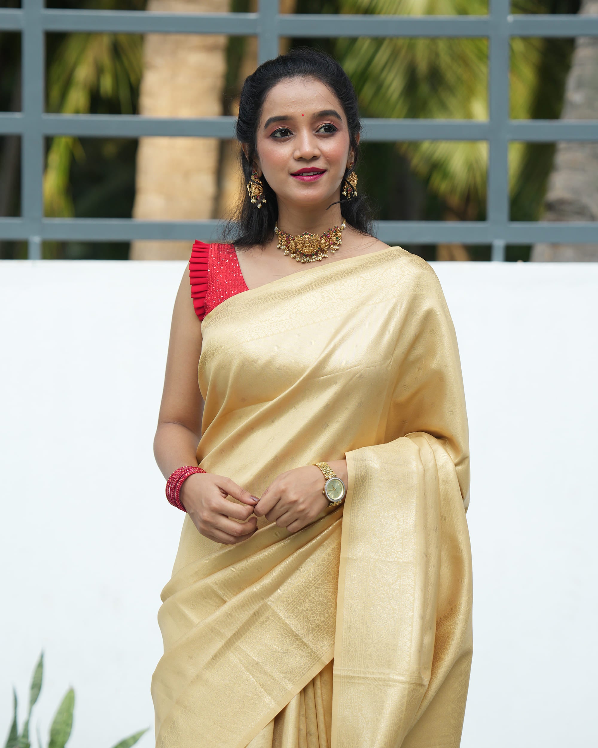 Tissue Saree With Embose Small Buttas